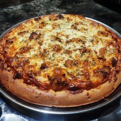 A picture of Chicken Pizza without oven.