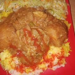 A picture of Beef biriani with a twist of vegetables.