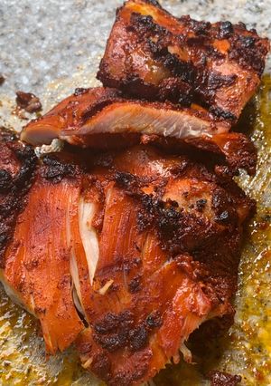 Una foto de Pollo en achiote