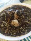 Arroz con chipirones rellenos en su tinta