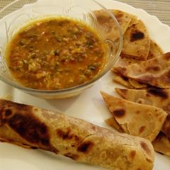 A picture of #localfoodcontest_Kisumu wheat flour Chapati/ Chappo & Ndengu.
