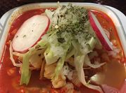 Una foto de espinazo de puerco en salsa