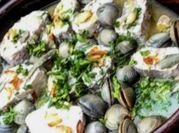 Una foto de almejas al horno