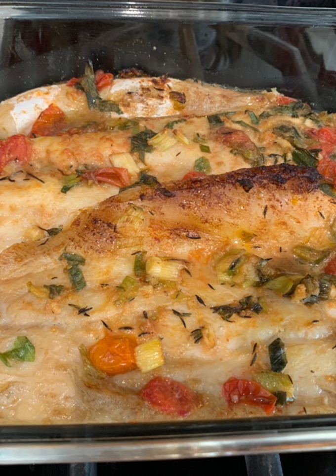 Una foto de Branzino al horno