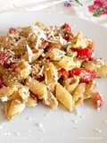 Mezze penne alla crudaiola arricchita con crema di melanzane