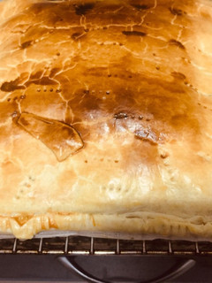 Una foto de Empanada de bacon y dátiles