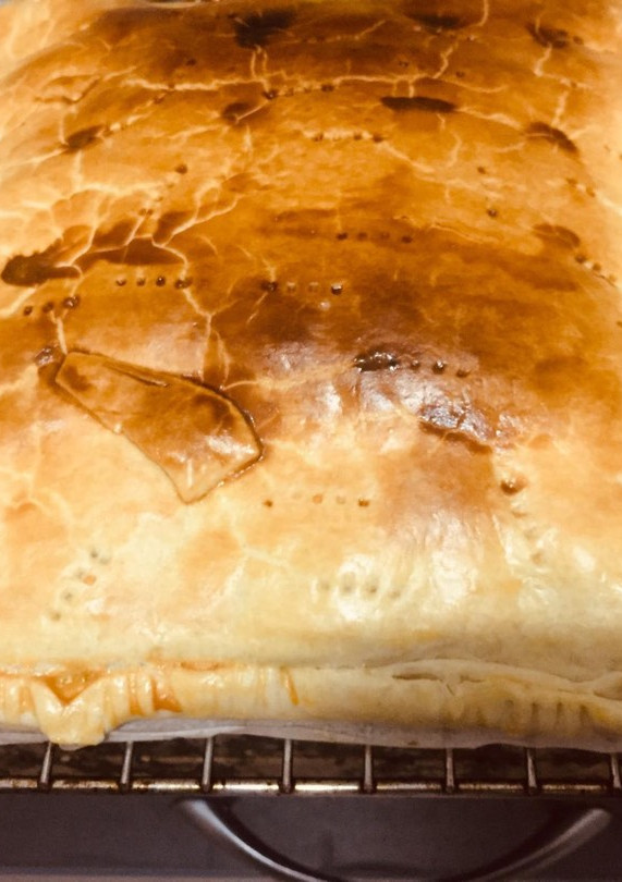 Una foto de Empanada de bacon y dátiles