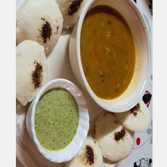 A picture of South Indian Platter....Idli Sambhar with Coconut Chutney..