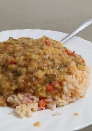 A picture of Lentil served with rice.