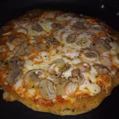 A picture of Mushroom and onion Pizza.