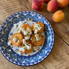 A picture of 🍑 Baked apricots, ricotta, pistacio, honey.