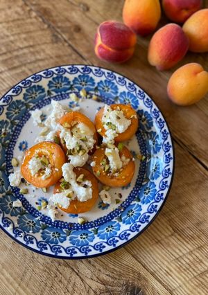 A picture of 🍑 Baked apricots, ricotta, pistacio, honey.