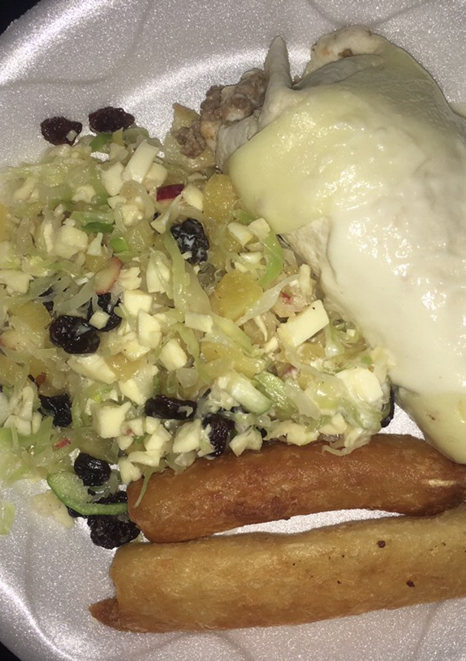 Una foto de Burrito relleno con salsa de champiñones