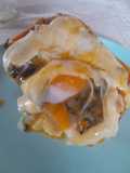 Calabaza rellena con muzzarella, espinaca y huevo