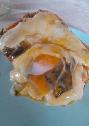 Una foto de Calabaza rellena con muzzarella, espinaca y huevo