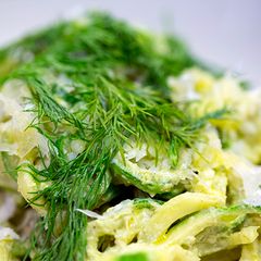 A picture of Zucchini Noodles with Pesto of garlic scapes and Marcona almonds.