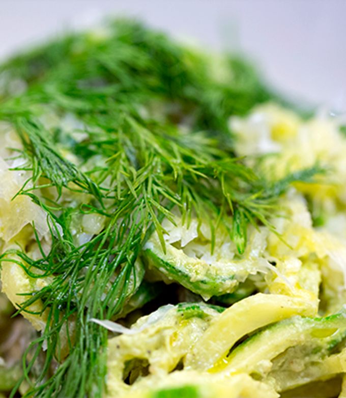 A picture of Zucchini Noodles with Pesto of garlic scapes and Marcona almonds.