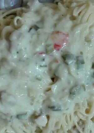 Una foto de Fideos con salsa de leche y cebolla de verdeo