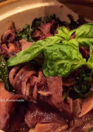 A picture of Stir-Fried Baby Squid with Thai Basil.