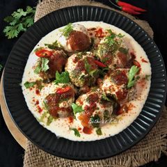 Dahi Vada (Fried Lentil Dumplings In Spiced Yogurt) A picture of Dahi Vada (Fried Lentil Dumplings In Spiced Yogurt).