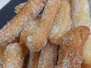Una foto de churro con manteca