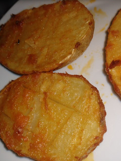 Una foto de Patatas asadas