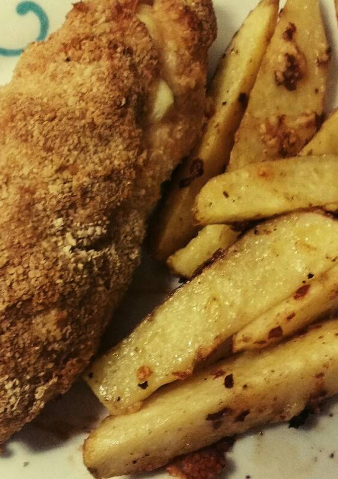 Una foto de Pechuga rellena con papas picantes