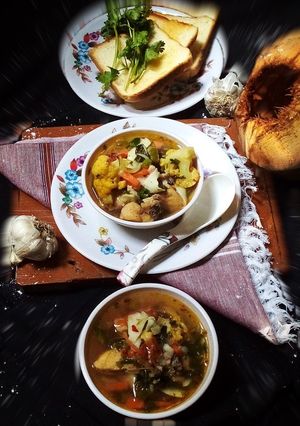 A picture of Tender coconut chicken soup.
