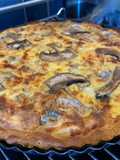 Spinach, mushrooms and other veggies quiche with blue cheese