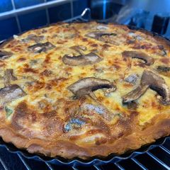 Spinach, mushrooms and other veggies quiche with blue cheese A picture of Spinach, mushrooms and other veggies quiche with blue cheese.