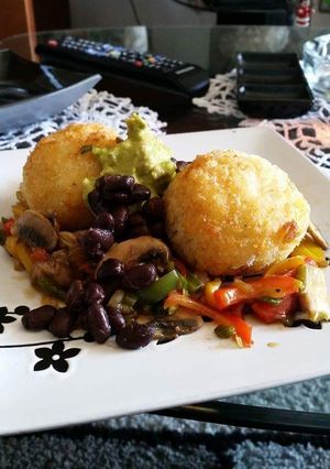 Una foto de Bolitas de arroz rellenas con salteado de mix de vegetales