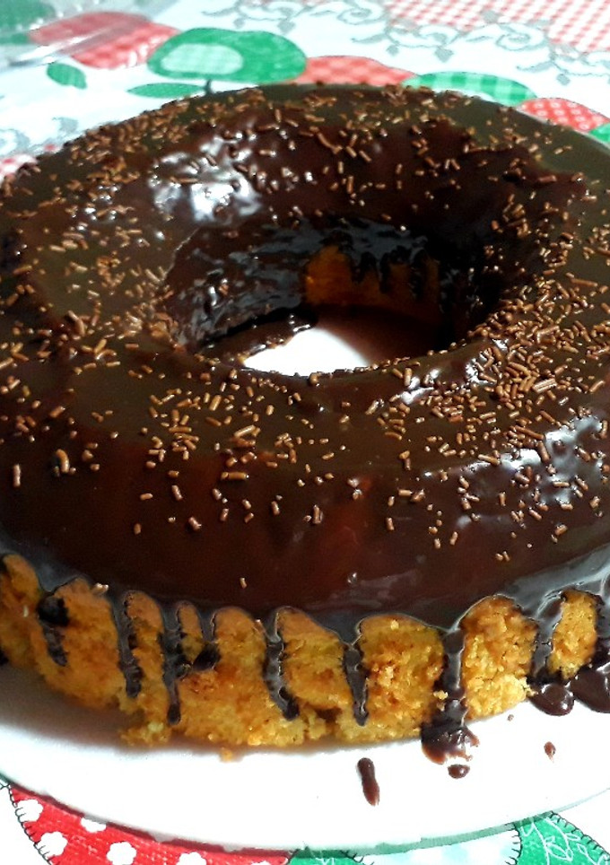 Una foto de Bizcochuelo de mandarina con cobertura de brigadeiro