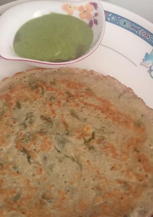 A picture of Bajra atta, sooji, curd, rice powder, coriander leaves uttapam.