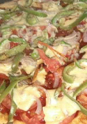 A picture of Pizza for kids without maida and yeast.