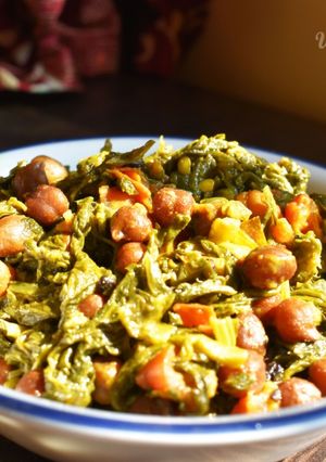 A picture of Chana diye Lai Shaak (Mustard Greens with Chickpeas).