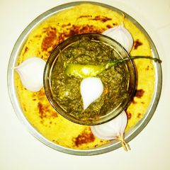 A picture of Makki ki roti aur Sarson ka saag.