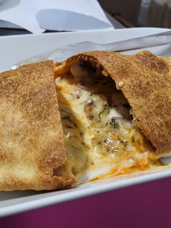 Una foto de Pizza calzone