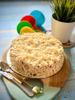 A picture of Indonesian Fermented Cassava Cheese Cake (Bolu Tape Keju).