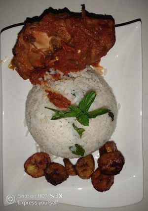 A picture of Minty white rice with stew.