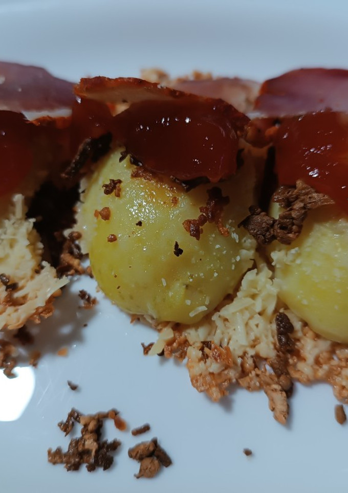 Una foto de Patatas al horno con queso