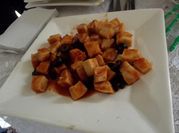 Una foto de calamar asado