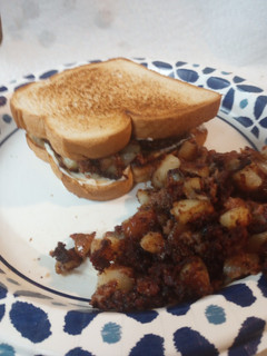 A picture of Leftover Cornbeef Hash on Toasted Bread.