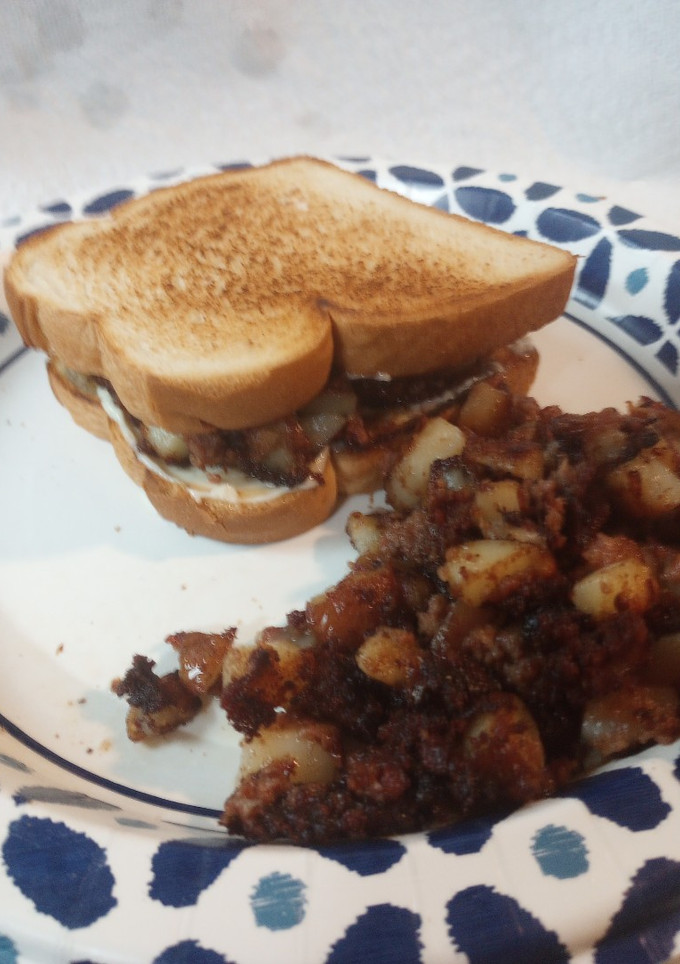 A picture of Leftover Cornbeef Hash on Toasted Bread.