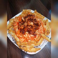A picture of Turkish Cicken with Saucy Macaroni.