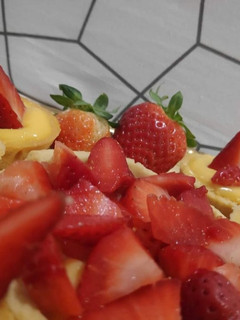 Foto di Pasticcini con crema pasticcera e fragole