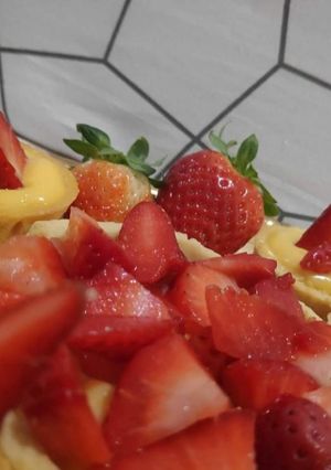 Foto di Pasticcini con crema pasticcera e fragole