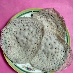 A picture of Appam (Rice coconut pancake).