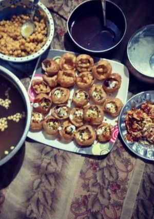 A picture of Homemade golgappe with tangy mangy spicy juice🍸.
