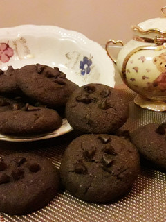 A picture of Chocolate cookies with choco chips.