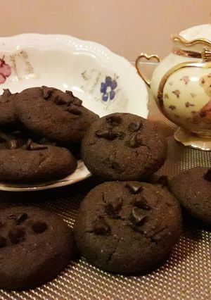 A picture of Chocolate cookies with choco chips.